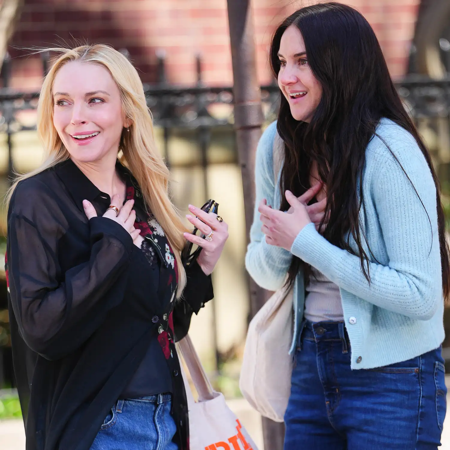 Lindsay-Lohan-and-Shailene-Woodley-040626-f347a66cd48149e19736e3a80715b8e5.webp