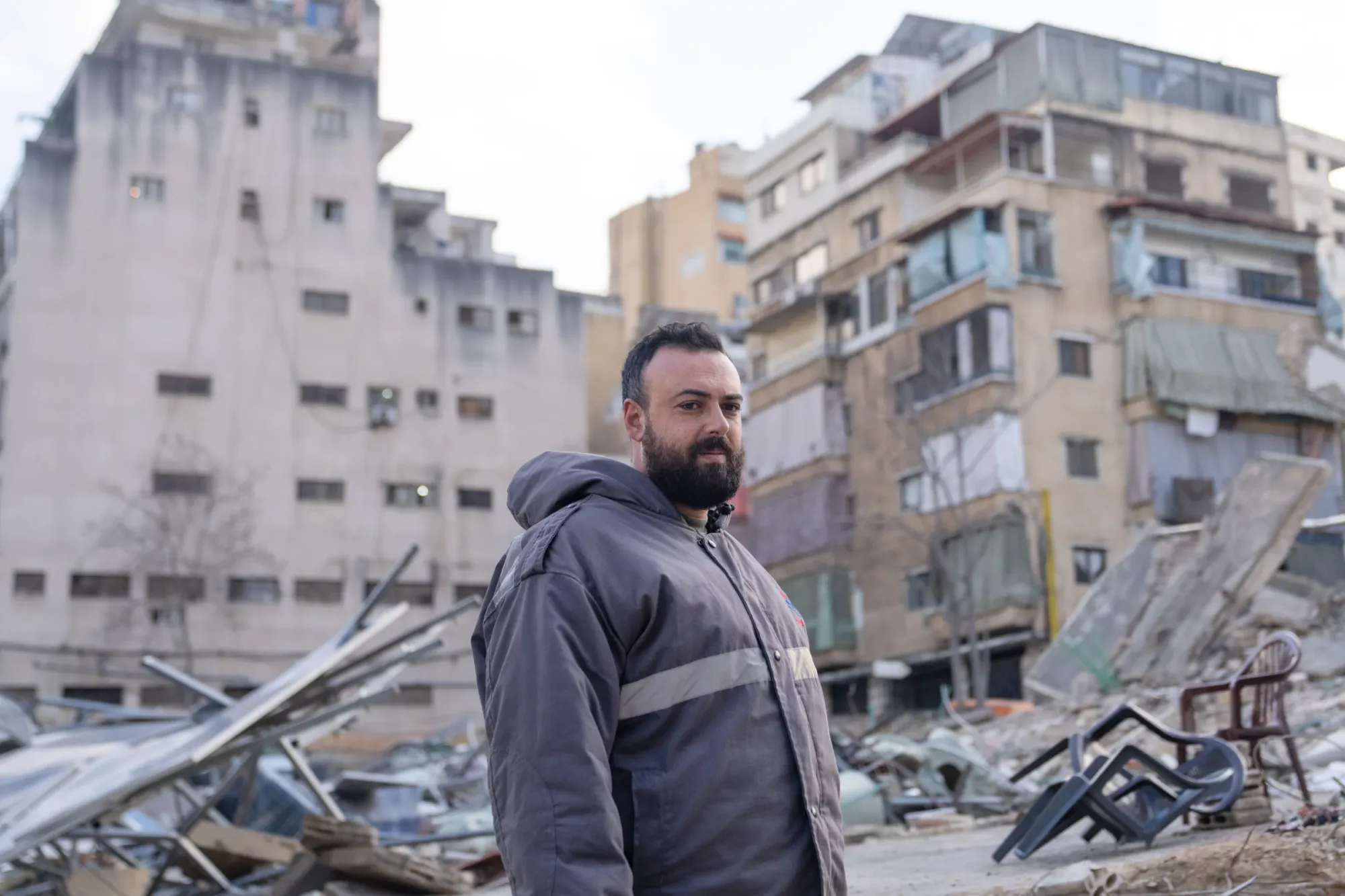 Mohammed Farhat is the operations director for the Islamic Health Authority, which includes Hezbollah's ambulance service. He stands at the site of an Israeli strike in a central part of Beirut.