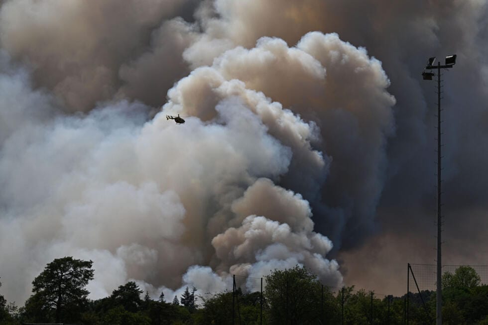 A pyrocumulonimbus, a giant cloud created by a large wildfire is seen in the Fontainebleau forest region, about 60 kilometers (37 miles) south of Paris, France.