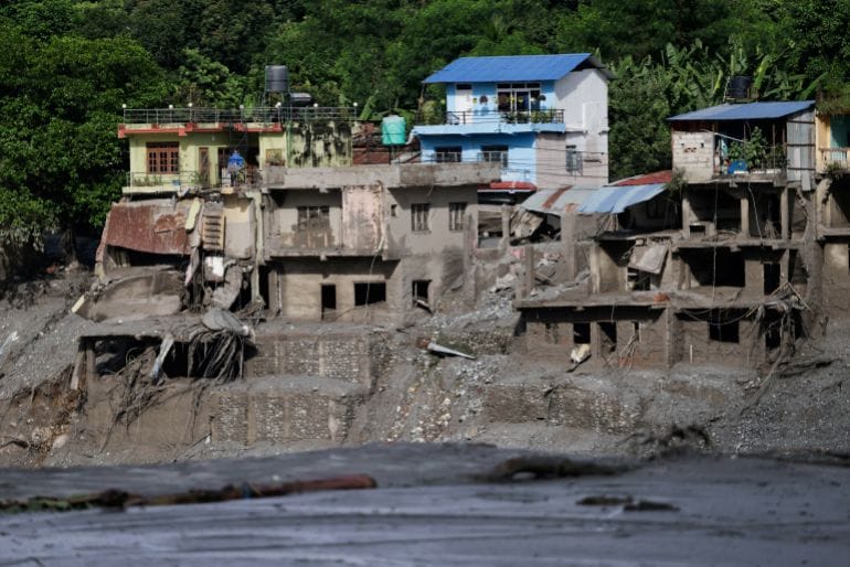 Damaged houses following devastating floods, in Trishuli in Nuwakot district, Nepal