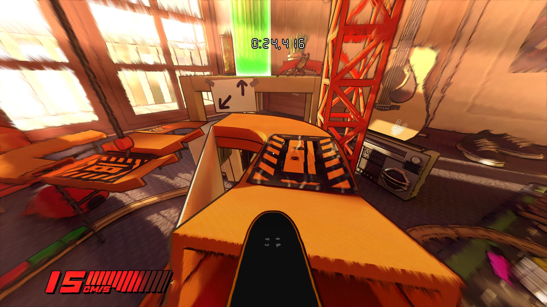 A skateboard racing down a cardboard track inside a cluttered room