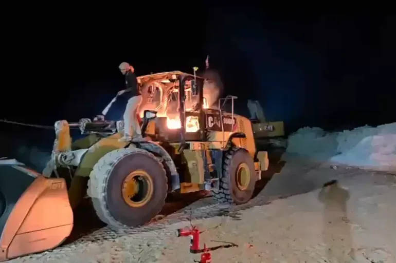 A bulldozer at the Ein Samia stone crusher shows severe damage after Israeli settlers infiltrated the site and set fire to heavy equipment